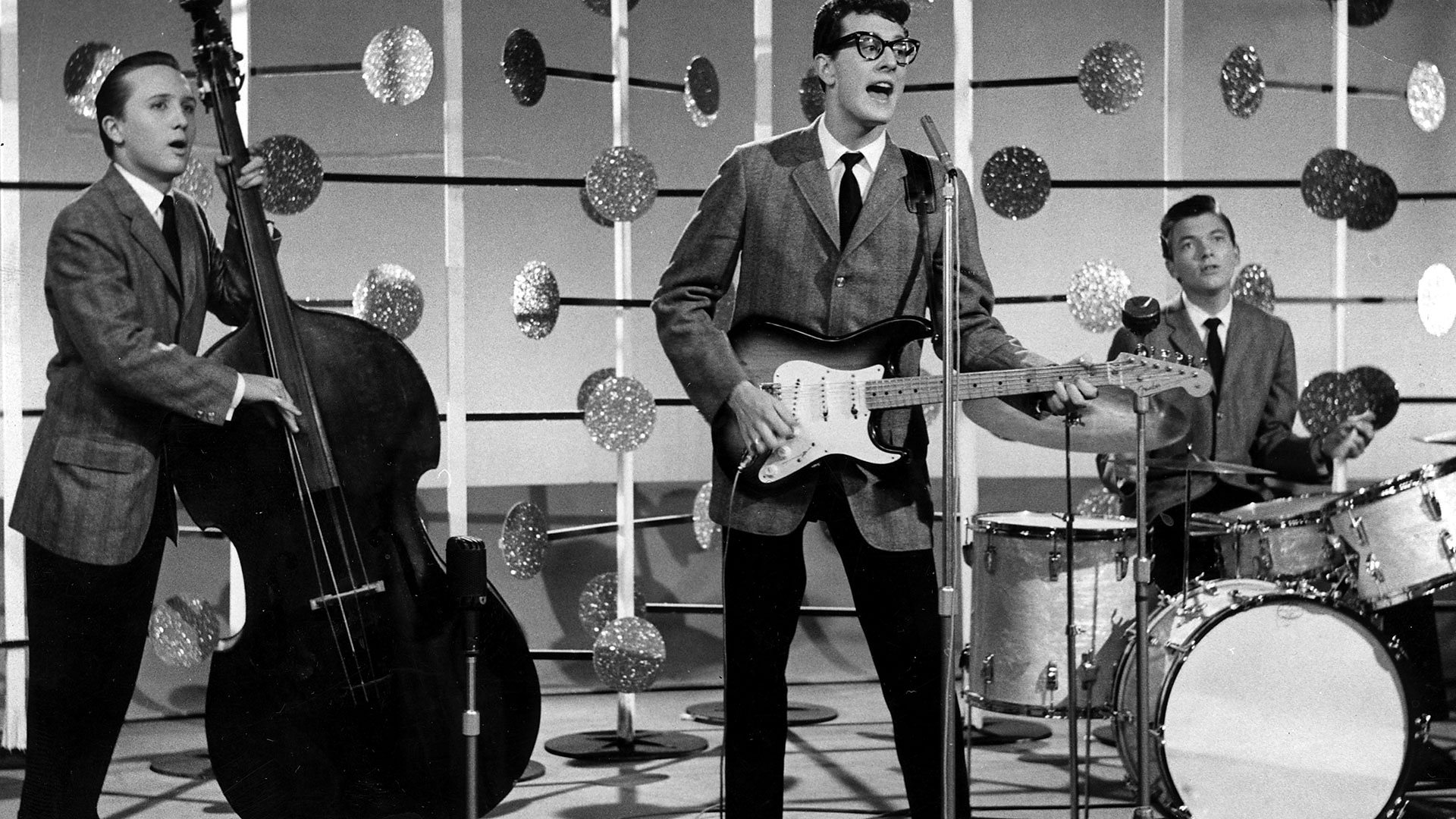 Песни 60 70 зарубежные. Buddy Holly. Гитара Бадди Холли. Buddy Holly and the Crickets. Buddy Holly и Beatles.