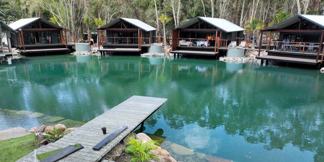 Sandstone Point Holiday Resort is set to add overwater villas to its